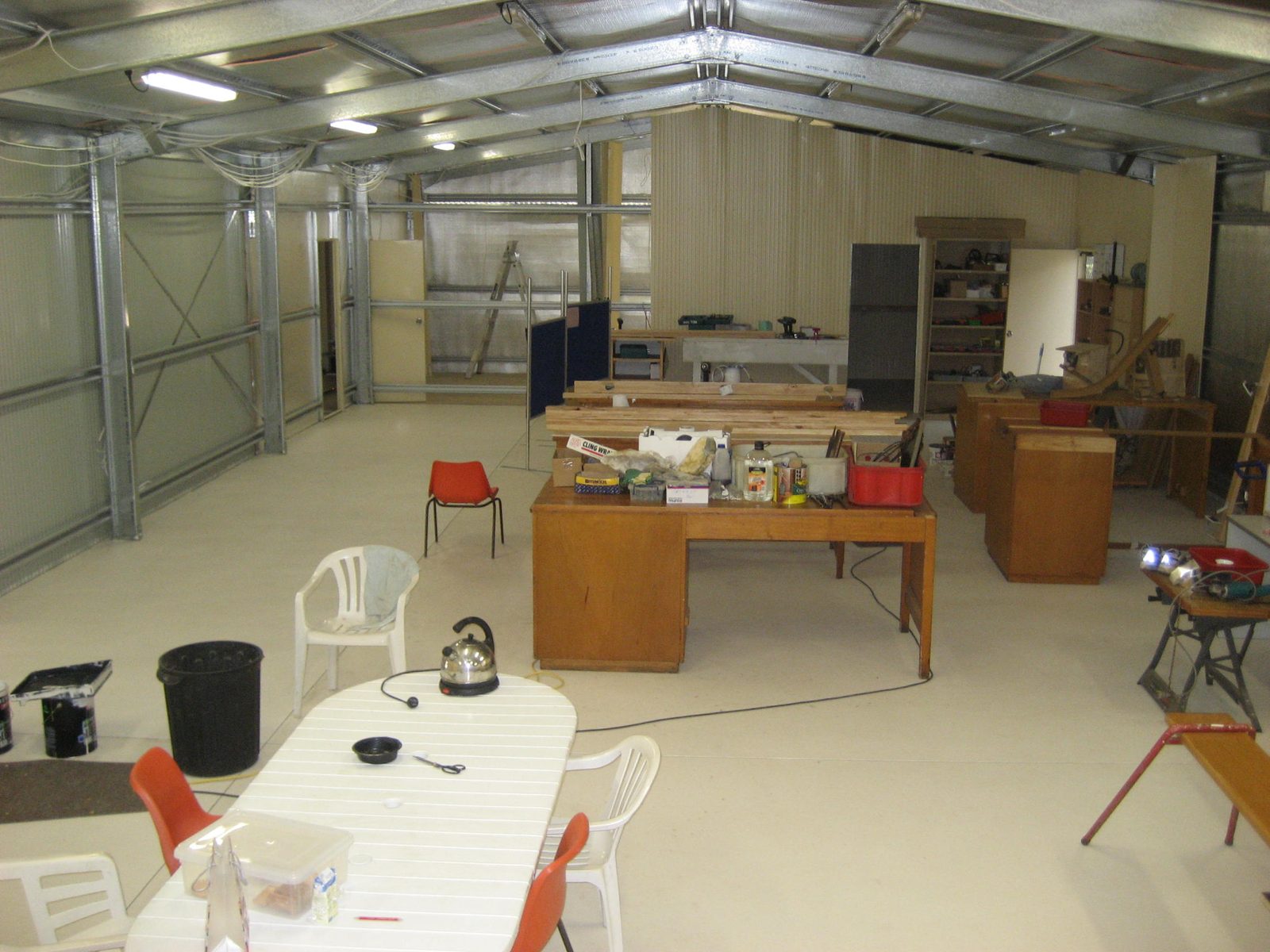 Interior of the completed shed shell showing its high vaulted roofline
